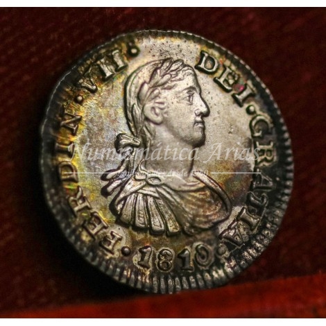 Fernando VII. 1/2 real. 1810. México. Ensayador: HJ. NGC MS62.